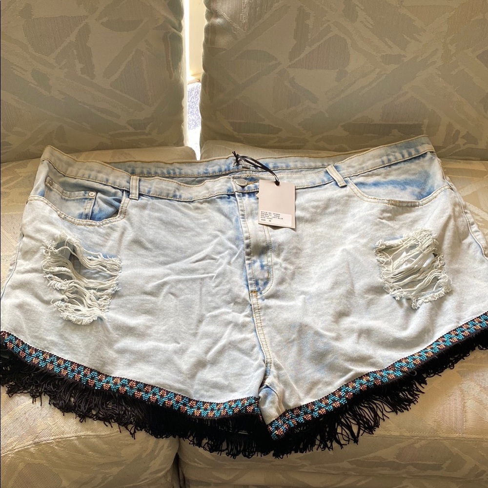 Stylish Light Blue Denim Shorts with Fringe